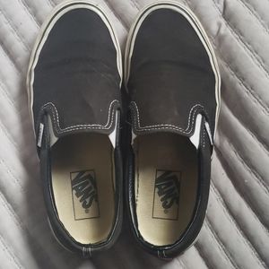 Black and white slip on vans